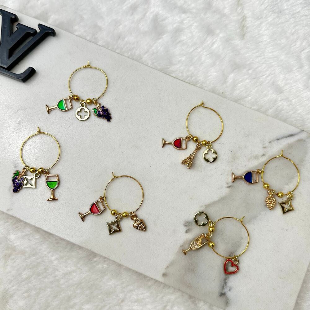 Handmade wine charms resembling LV characters NEW Holiday party idea